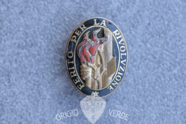 Distintivo ferito per la Rivoluzione